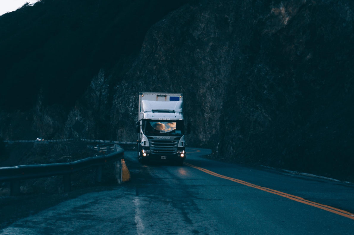 Autonomous vehicle technology and self-driving truck on a winding road