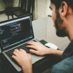 a man working on a laptop