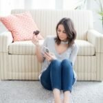 a woman sitting on a couch