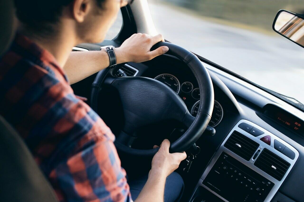 a person driving a car