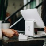 a person holding a coffee mug