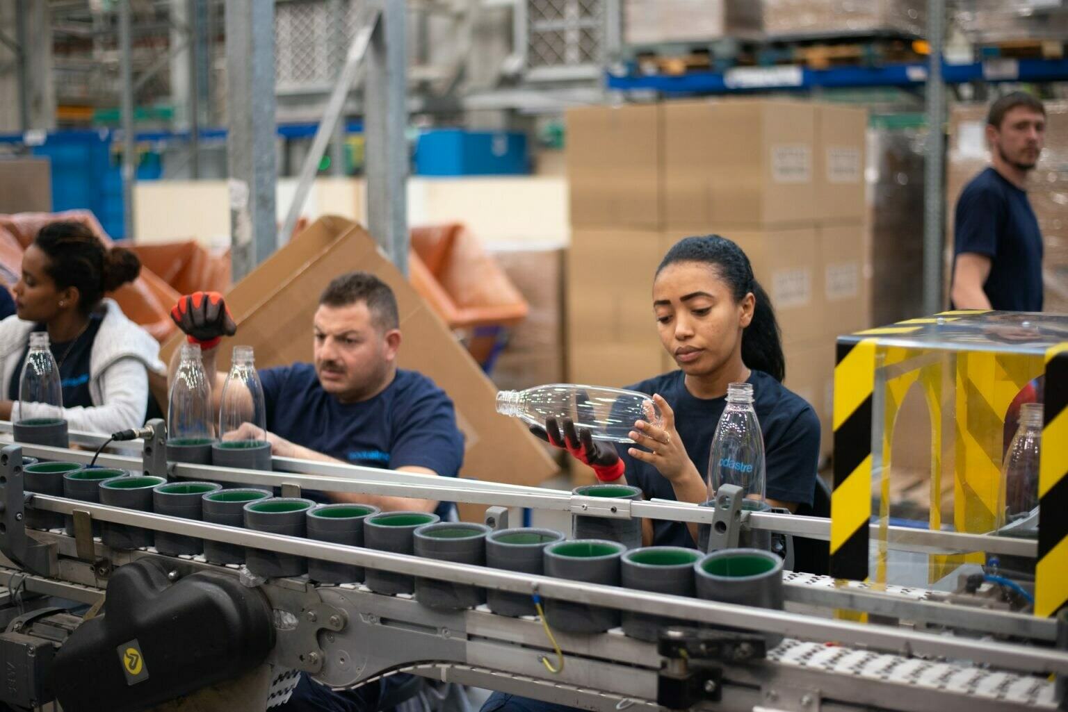 a group of people in a factory