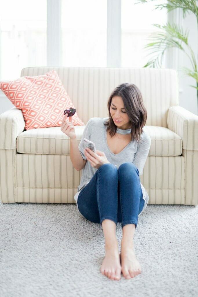 a woman sitting on a couch