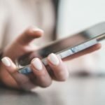 a person holding a pen