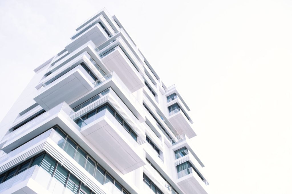 a tall building with a white sky