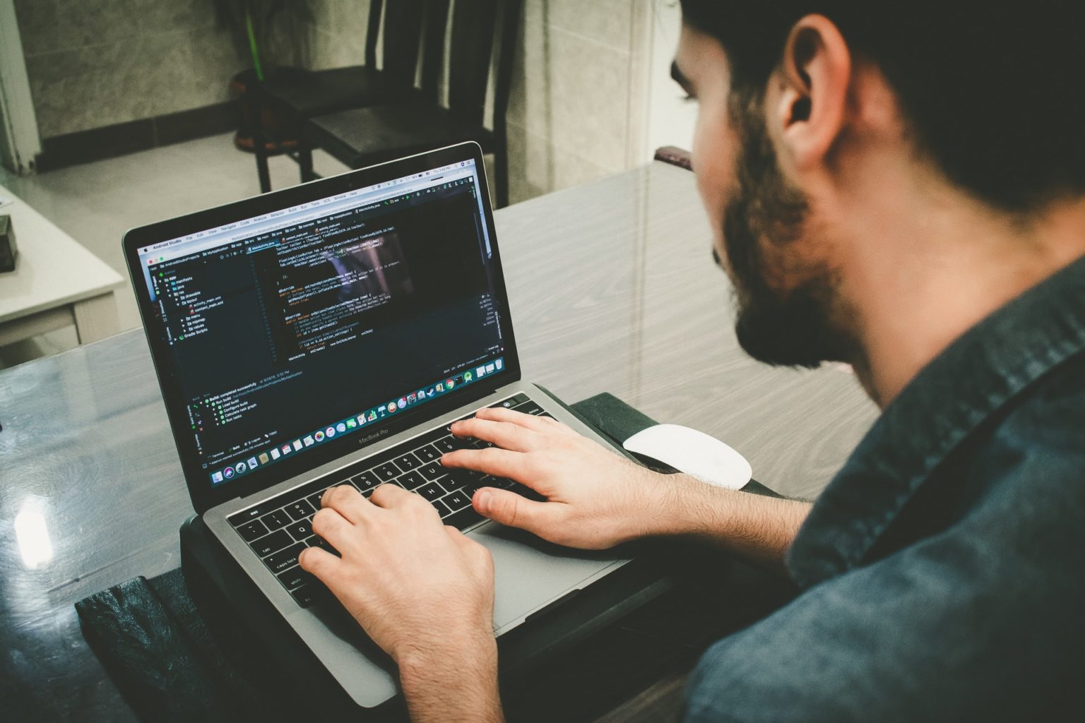 a man working on a laptop