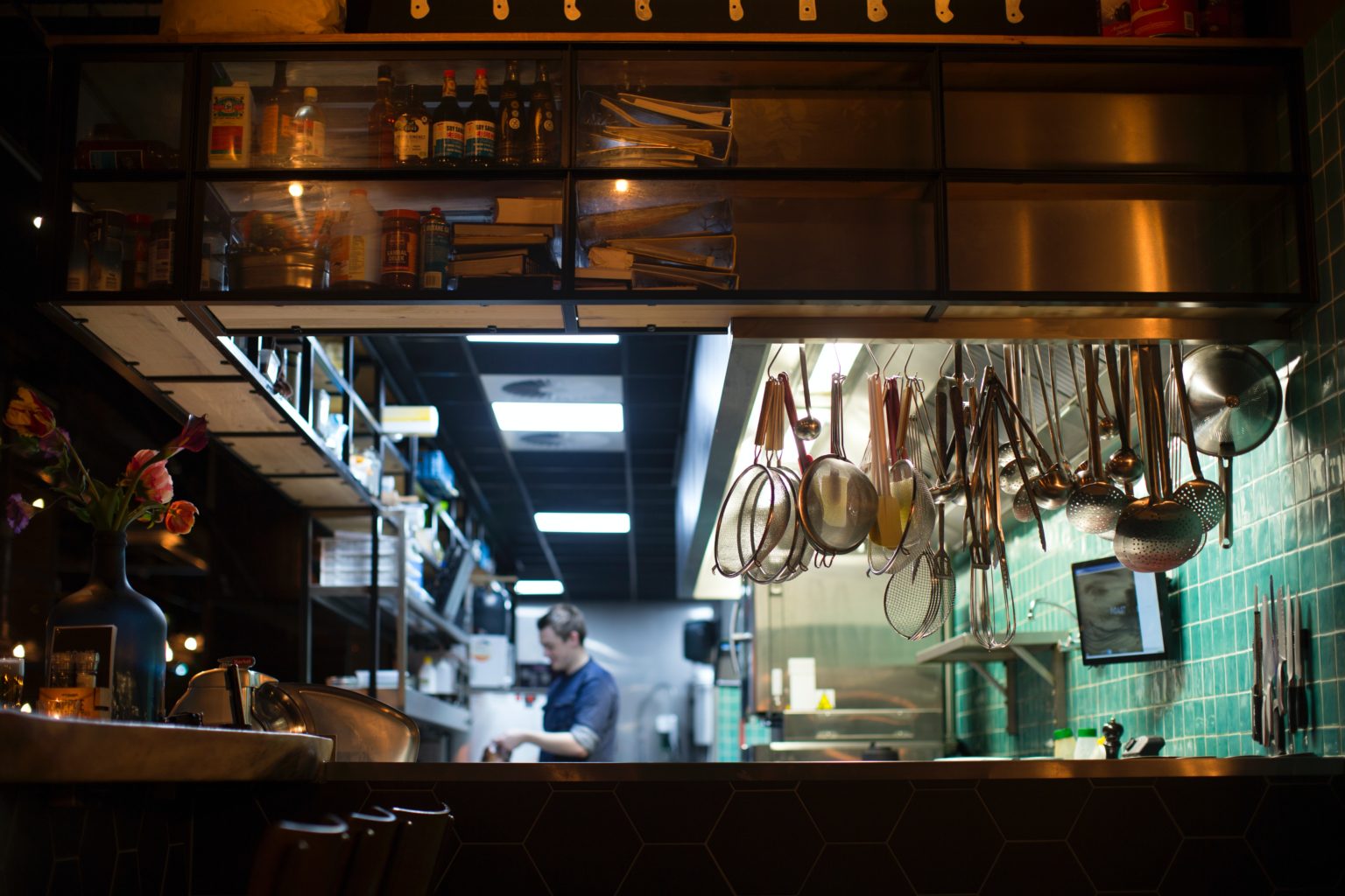 a person working in a kitchen