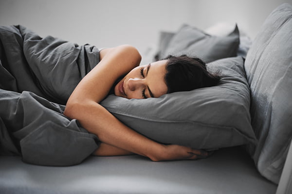 a person lying on a couch