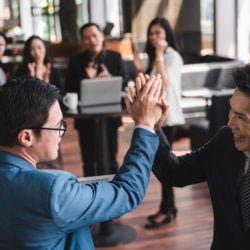 Group of sucessful business person and coworker hand shaking with smile and happy