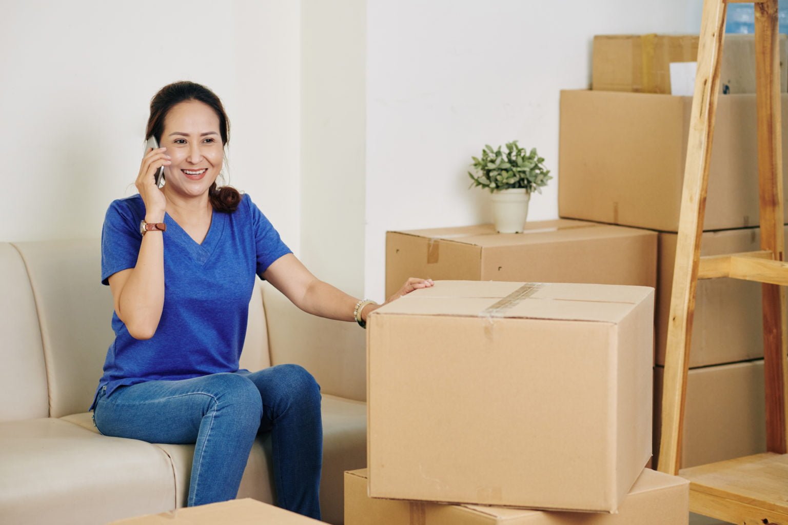 Woman calling to moving service company