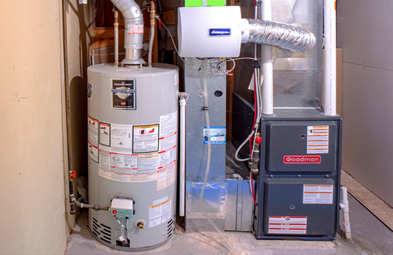 Water heater and Goodman furnace in Malvern home. Common furnace problems can lead to costly repairs. Get quick fixes in West Chester, PA.